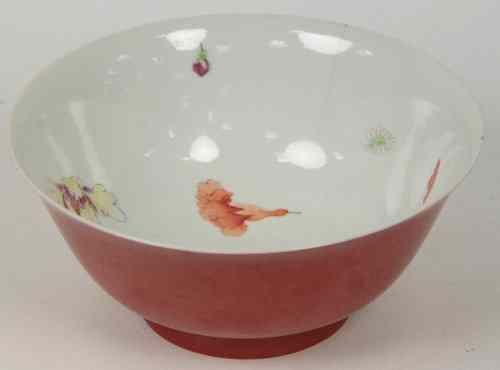 Appraisal: A Chinese bowl Qing dynasty the exterior of ruby red