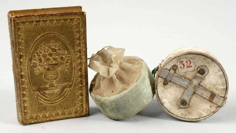 Appraisal: Lot of German Dresden Christmas Ornaments Description Includes book hat