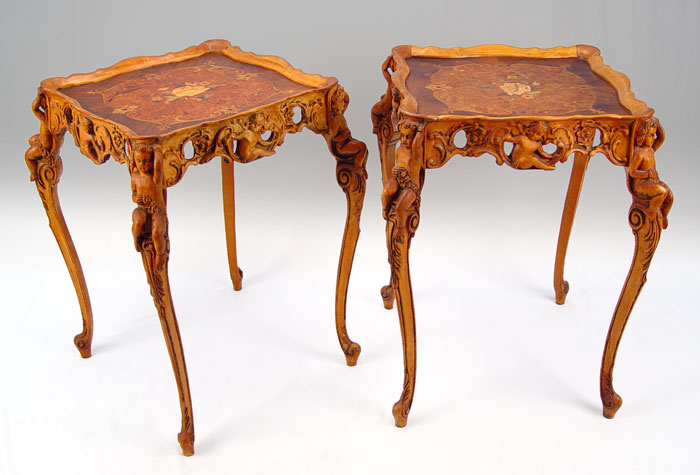 Appraisal: PAIR 'S HAND CARVED CHERUB FRUITWOOD TABLES Marquetry inlay top