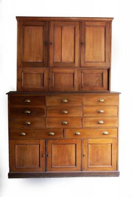 Appraisal: A Victorian mahogany housekeepers cabinet the upper section fitted three