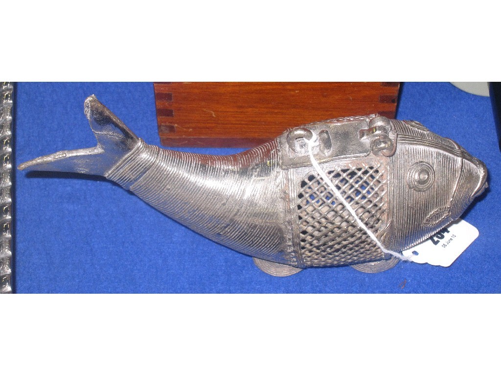 Appraisal: White metal incense burner modelled as a fish