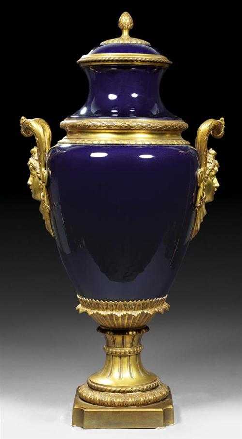 Appraisal: VASE WITH BRONZE MOUNT AUX MASCARONS Louis XVI style Paris