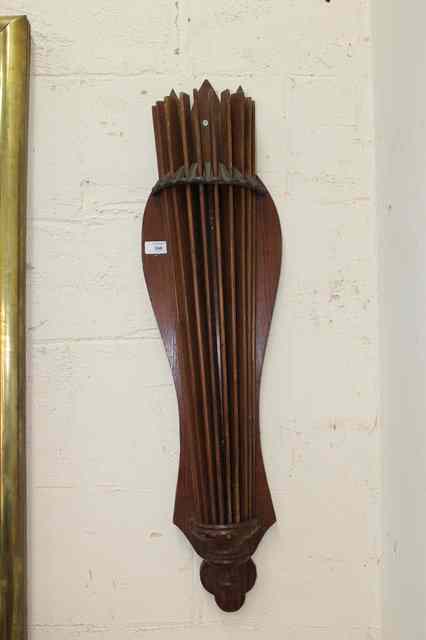 Appraisal: AN EDWARDIAN PITCH PINE AND CAST IRON RETRACTABLE WALL MOUNTED