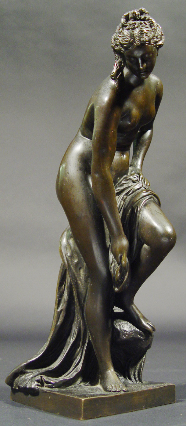 Appraisal: Bronze figurine of a scantily clad nude in robes cm