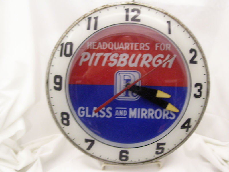 Appraisal: PPG Bubble Face Clock Bubble face clock Red and blue