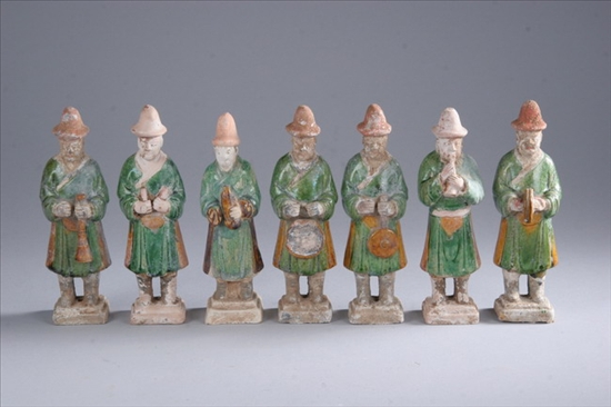 Appraisal: SEVEN CHINESE SANCAI POTTERY FIGURES OF MUSICIANS Ming Dynasty Each