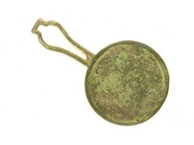 Appraisal: A Roman bronze hand mirror with an open handle in