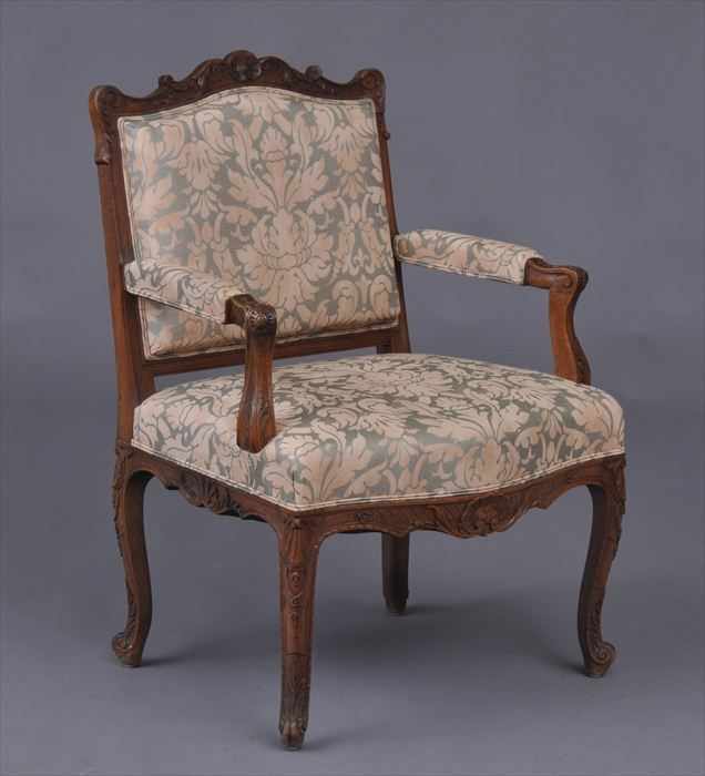 Appraisal: REGENCY-STYLE CARVED WALNUT FAUTEUIL LA REINE The padded back with