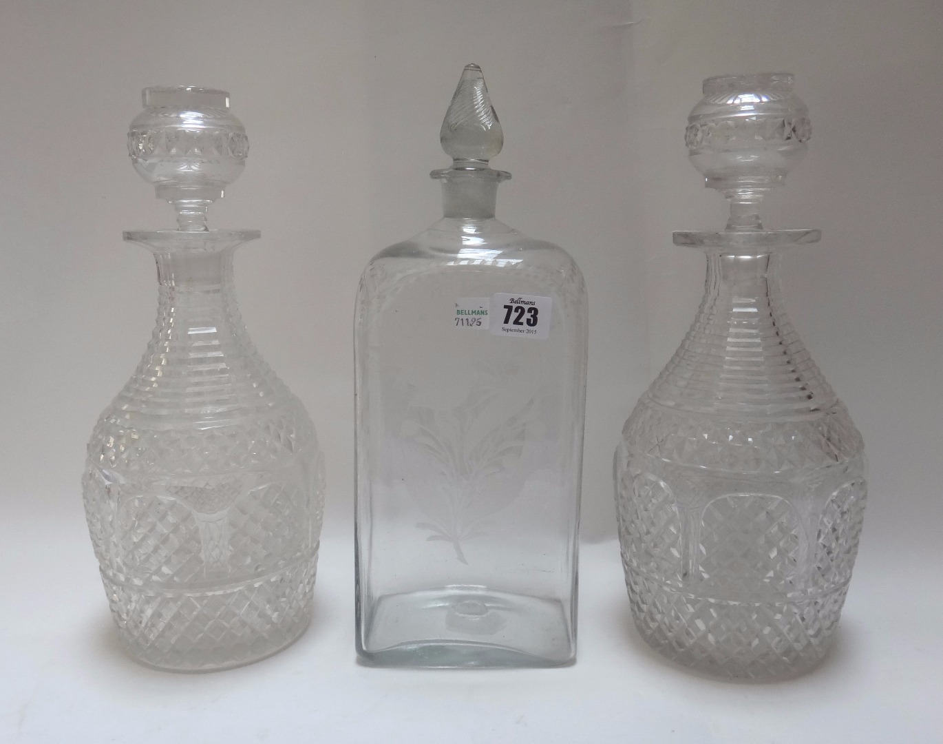 Appraisal: A pair of Victorian heavy cut glass decanters and stoppers