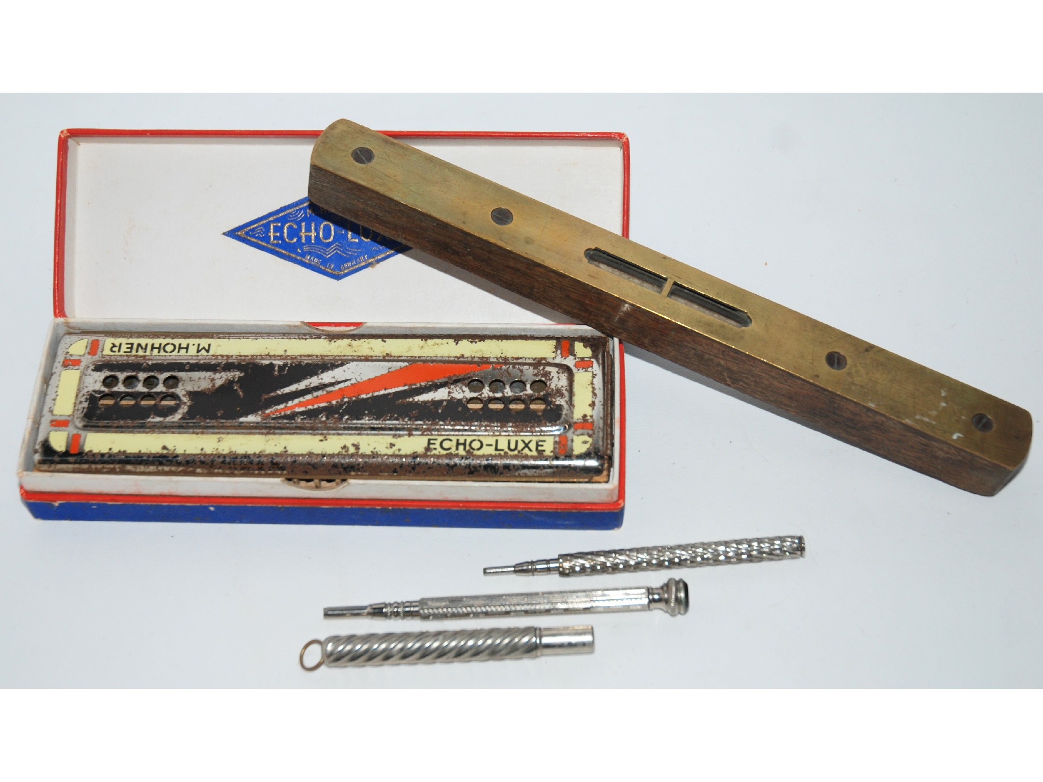 Appraisal: A box of miscellania including white metal pencils mouth organ