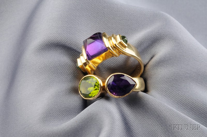 Appraisal: Two kt Gold Gem-set Rings one bezel-set with an oval-shape