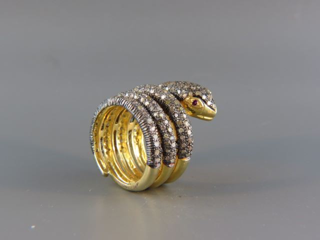 Appraisal: Diamond Snake Ring loaded with round diamonds in coiled gold