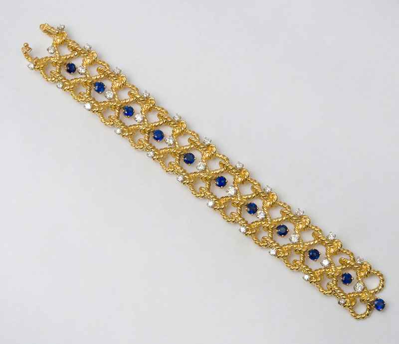 Appraisal: K GOLD DIAMOND AND SAPPHIRE BRACELET Set with full-cut diamonds