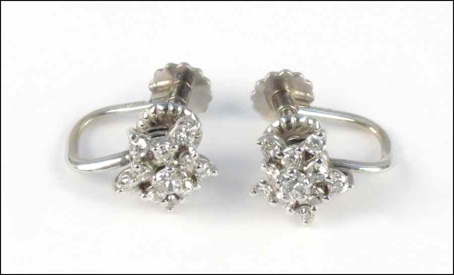 Appraisal: PAIR OF DIAMOND AND KARAT WHITE GOLD SCREWBACK EARRINGS Comprised