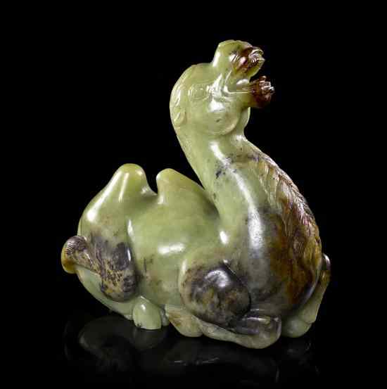 Appraisal: A Jade Figure of a Camel of olive colored stone