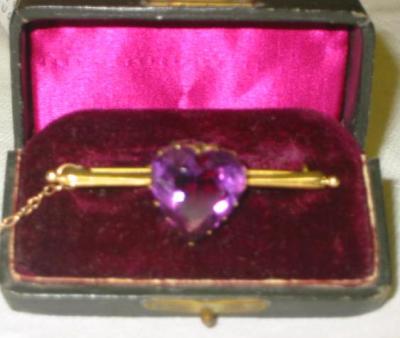 Appraisal: AN AMETHYST BROOCH the large heart cut amethyst claw set