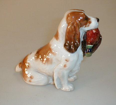 Appraisal: A Royal Doulton figure of a spaniel holding a pheasant