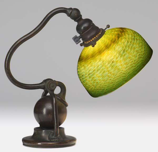 Appraisal: TIFFANY STUDIOS Bronze counter-balance desk lamp with green glass damascene