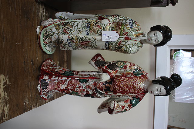 Appraisal: A PAIR OF ORIENTAL POSSIBLY JAPANESE PORCELAIN FIGURES of women