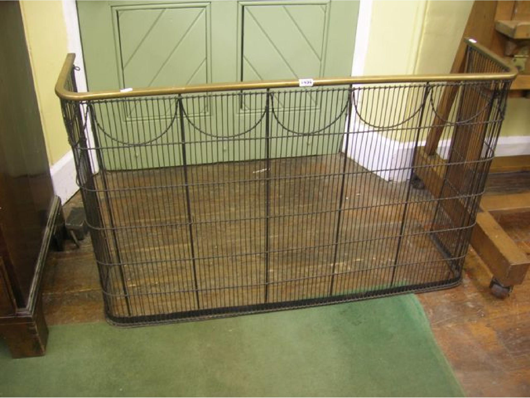 Appraisal: A Victorian wirework nursery fender with brass rails cm wide