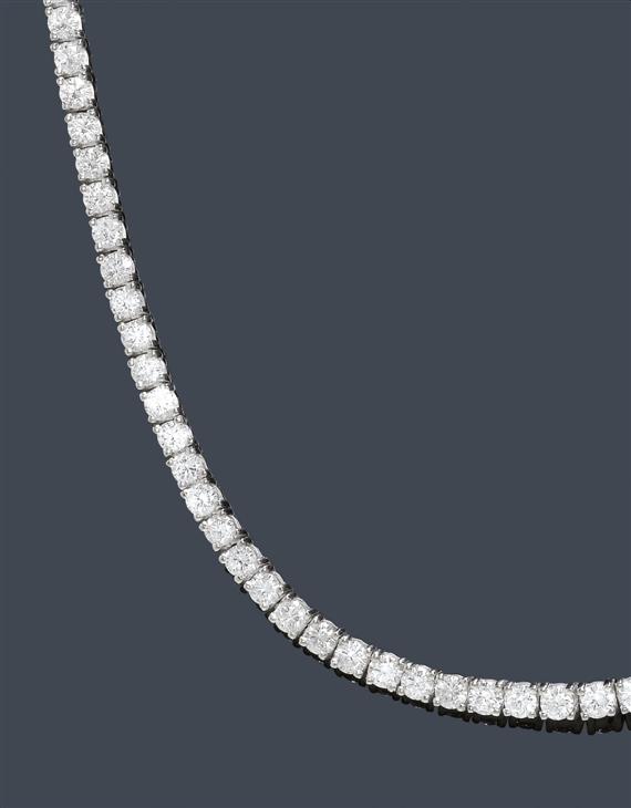 Appraisal: A DIAMOND NECKLACE White gold A classic rivi re necklace