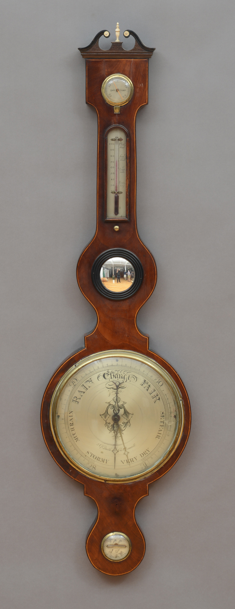 Appraisal: REGENCY INLAID MAHOGANY WHEEL BAROMETER The silvered metal dial signed