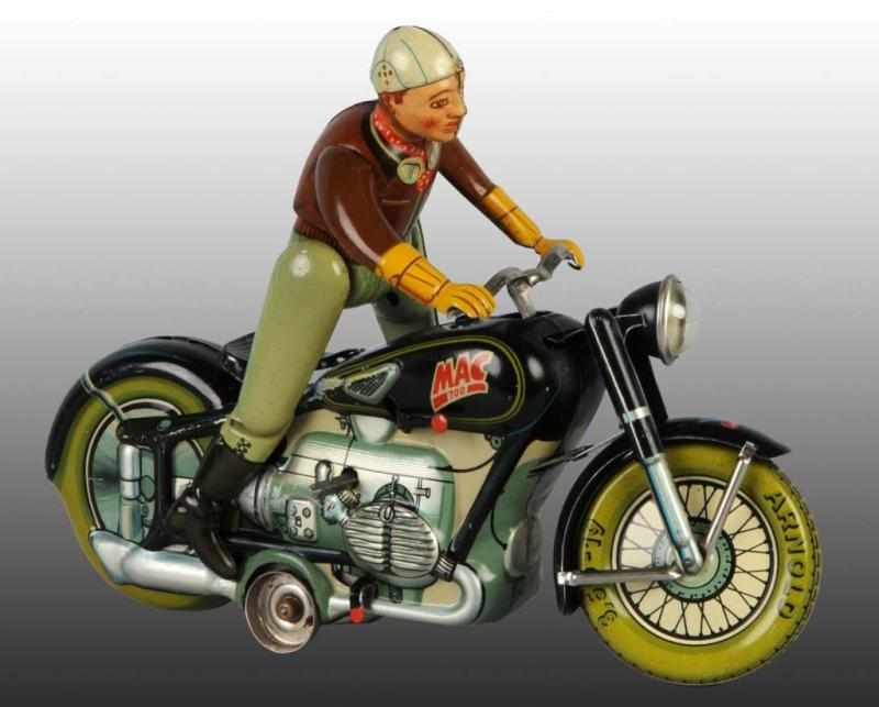 Appraisal: Tin Arnold Mac Motorcycle Wind-Up Toy Description German Working Marked