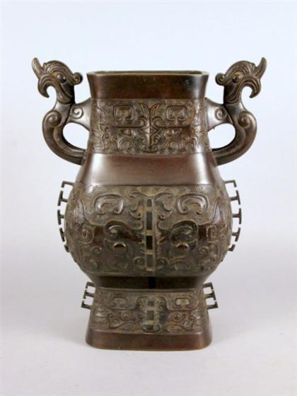 Appraisal: Chinese archaic-form twin-handled bronze vessel th century of squared baluster