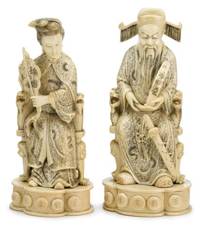 Appraisal: Pair of Chinese carved elephant ivory and ink-work figureslate th