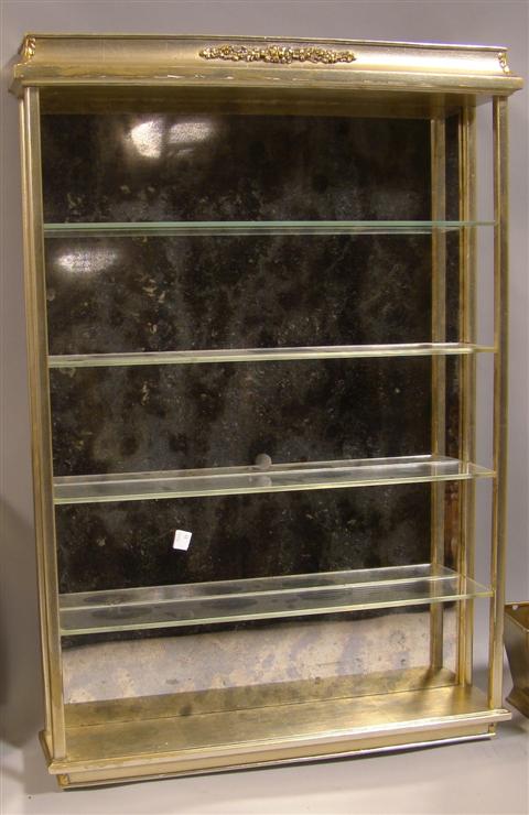 Appraisal: MARSHALL FIELDS GLASS DISPLAY SHELVES A giltwood and glass hanging