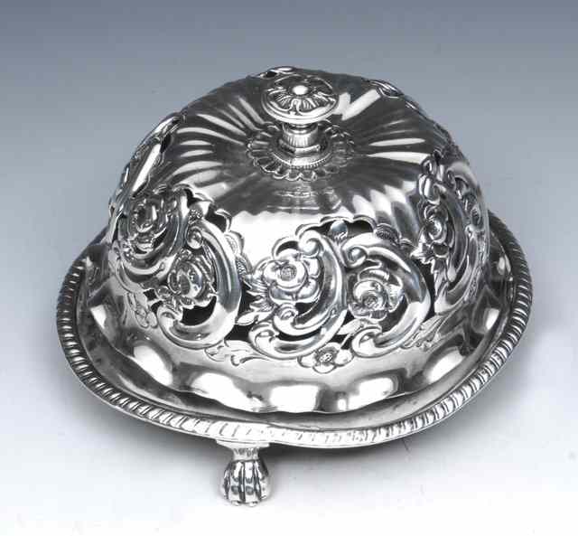 Appraisal: A VICTORIAN SILVER TABLE BELL with pressed and pierced scroll