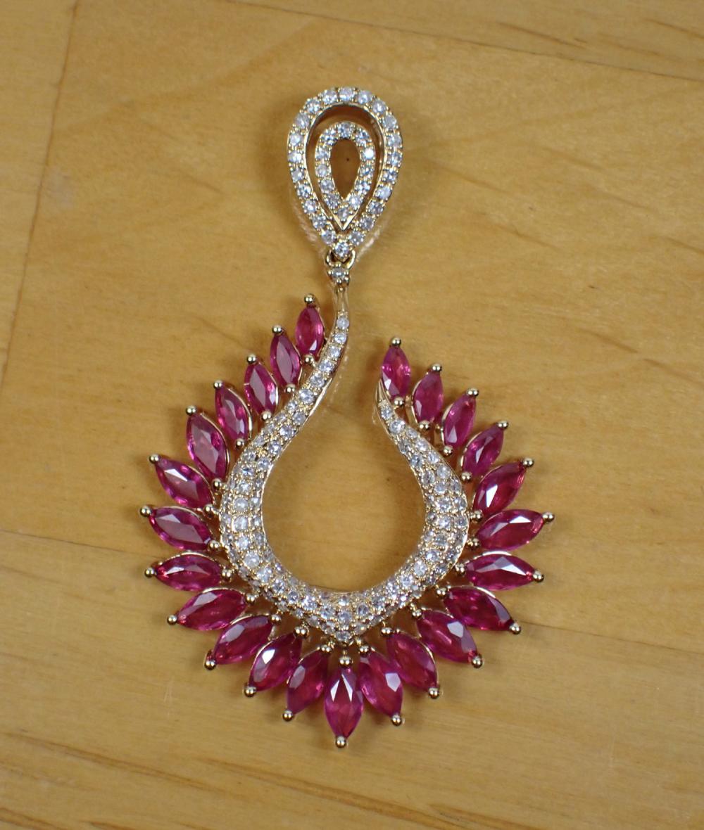 Appraisal: RUBY DIAMOND AND FOURTEEN KARAT GOLD EFFY PENDANT set with