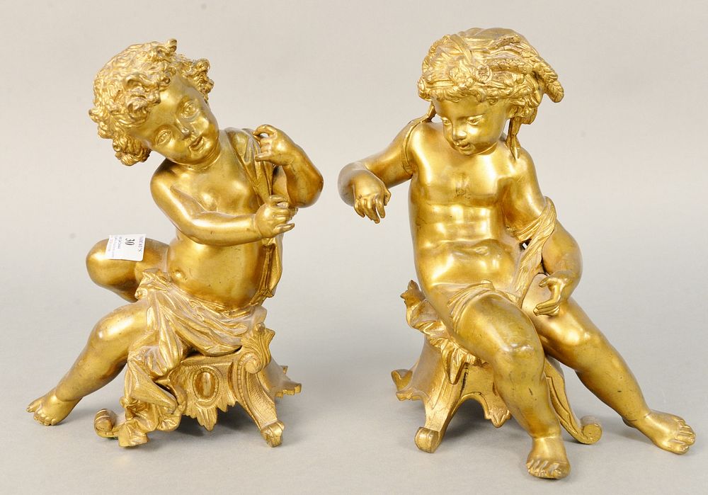 Appraisal: Pair French style bronze putti figures both in seated position