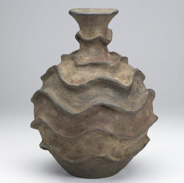 Appraisal: Impressive terra cotta vessel Rwanda With raised linear waves accented