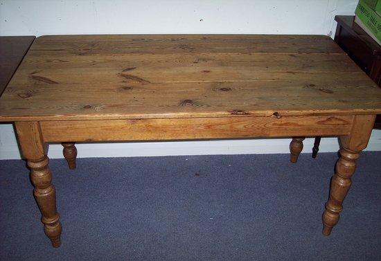 Appraisal: A rectangular pine table fitted a drawer to one end