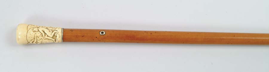 Appraisal: CANE CARVED TH CENTURY IVORY AND MALACCA CANE Tapered handle