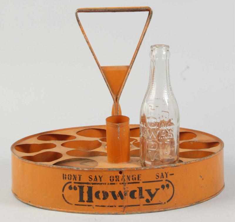 Appraisal: Tin Howdy Soda Bottle Carrier Description s Used for ballpark