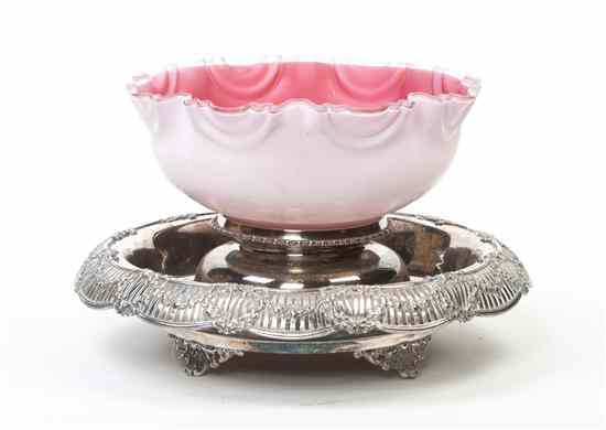 Appraisal: A Victorian Silverplate and Glass Bowl the white and pink