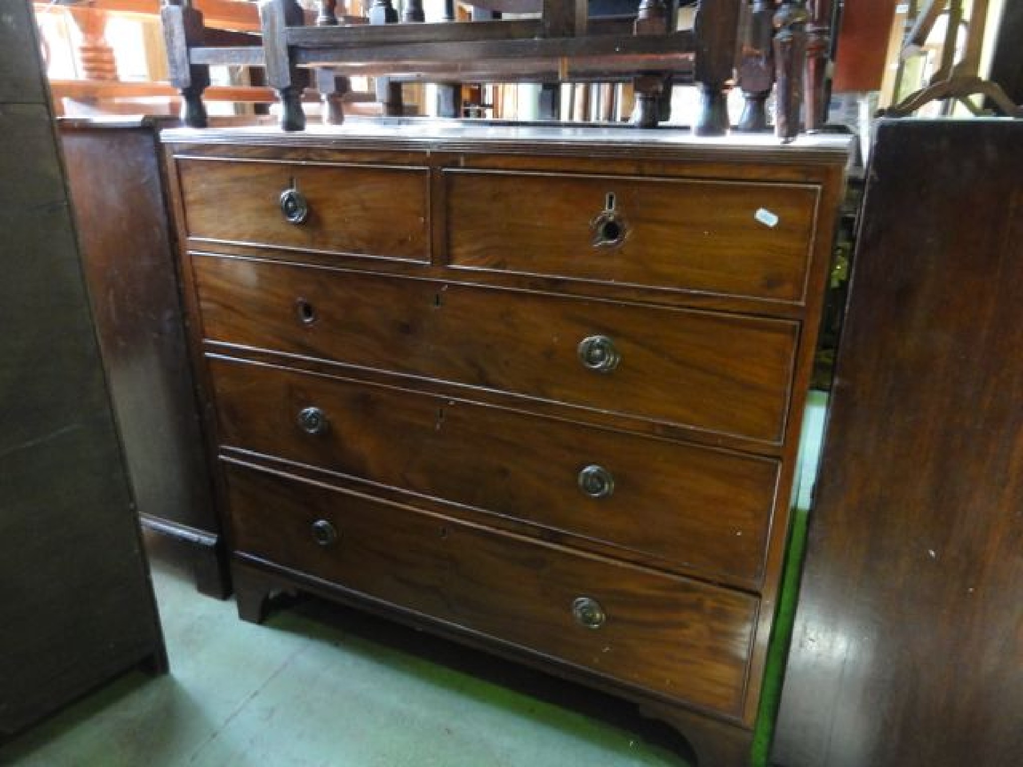 Appraisal: A th century mahogany flat fronted bedroom chest of three