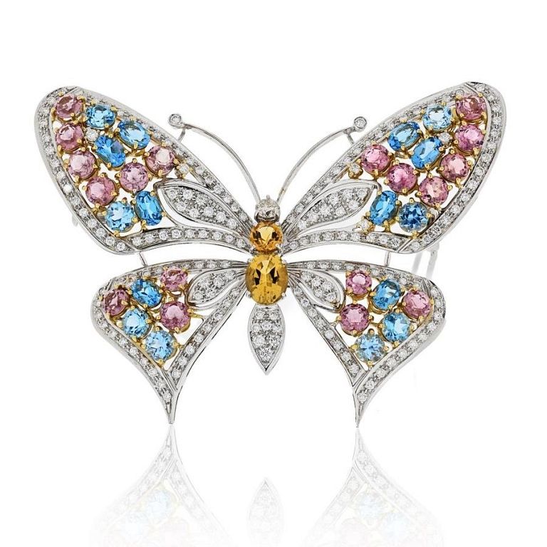 Appraisal: BUTTERFLY K WHITE GOLD MULTICOLOR GEMSTONE Multicolored gemstone and diamond