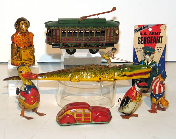 Appraisal: Japanese Windup toys A grouping of Japanese Lithographed windups from