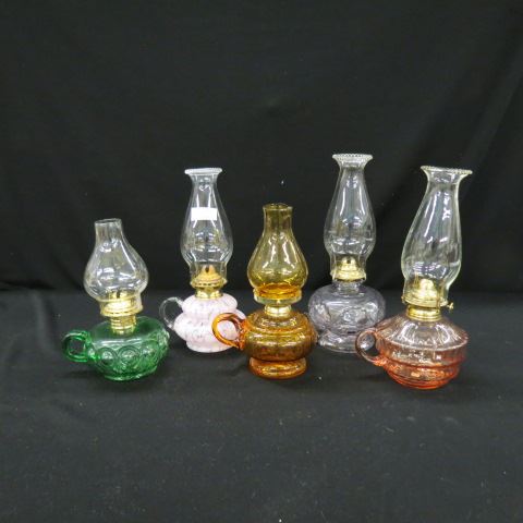 Appraisal: Vintage Oil Lamps finger style various colors