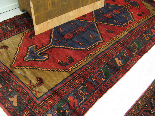 Appraisal: PERSIAN TRIBAL CARPET Hamadan province northwestern Iran centering two blue