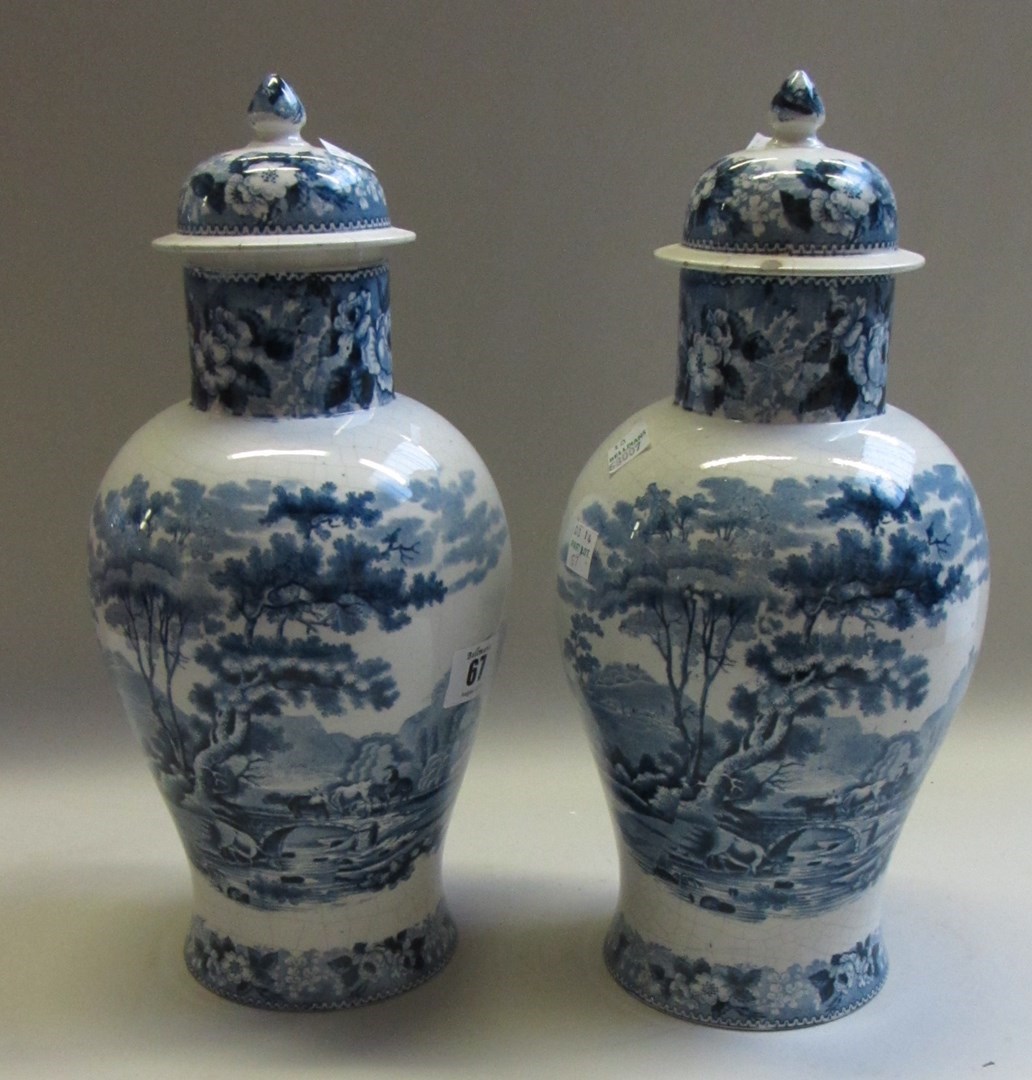 Appraisal: A pair of Dutch earthenware blue and white printed vases