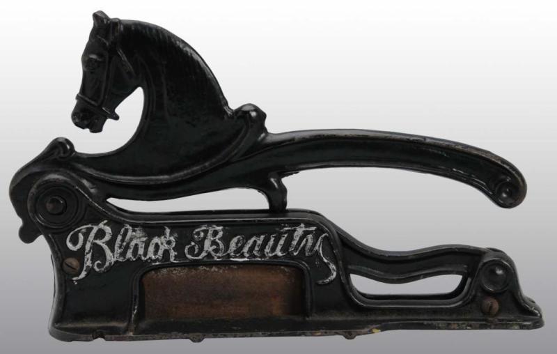 Appraisal: Cast Iron Black Beauty Figural Cigar Cutter Description Beautiful detail