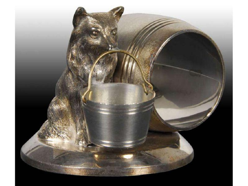 Appraisal: Seated Dog with Bucket Figural Napkin Ring Description Round raised