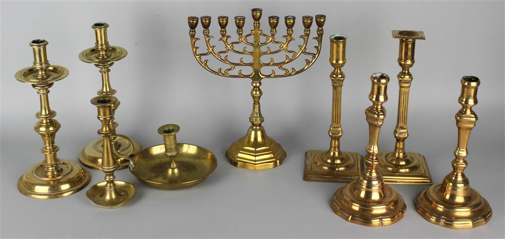 Appraisal: GROUP OF SEVEN ENGLISH BRASS CANDLESTICKS A CHAMBERSTICK AND A