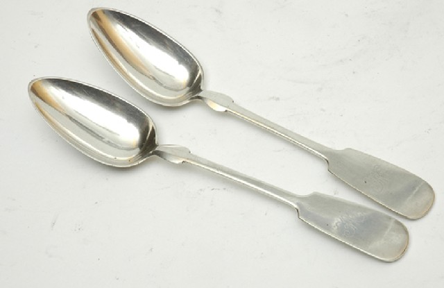 Appraisal: A PAIR OF CONTINENTAL SILVER FIDDLE PATTERN TABLE SPOONS Hallmarked