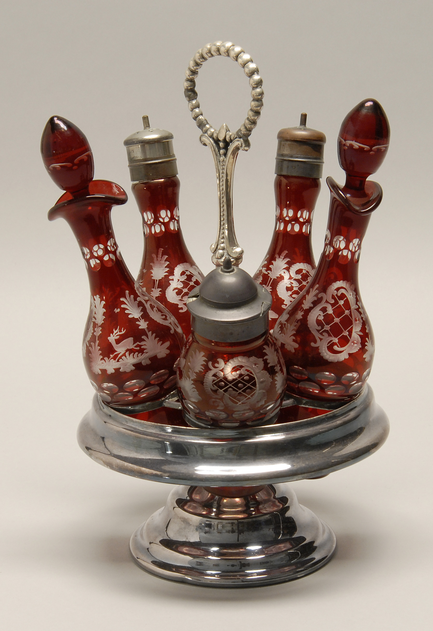 Appraisal: BOHEMIAN GLASS AND SILVER PLATED CRUET SET Early th CenturyFive