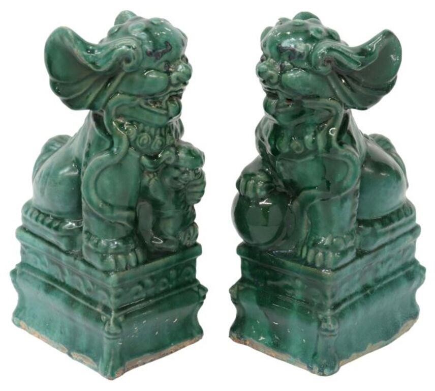 Appraisal: pair Chinese green glazed ceramic foo lions in mirrored seated